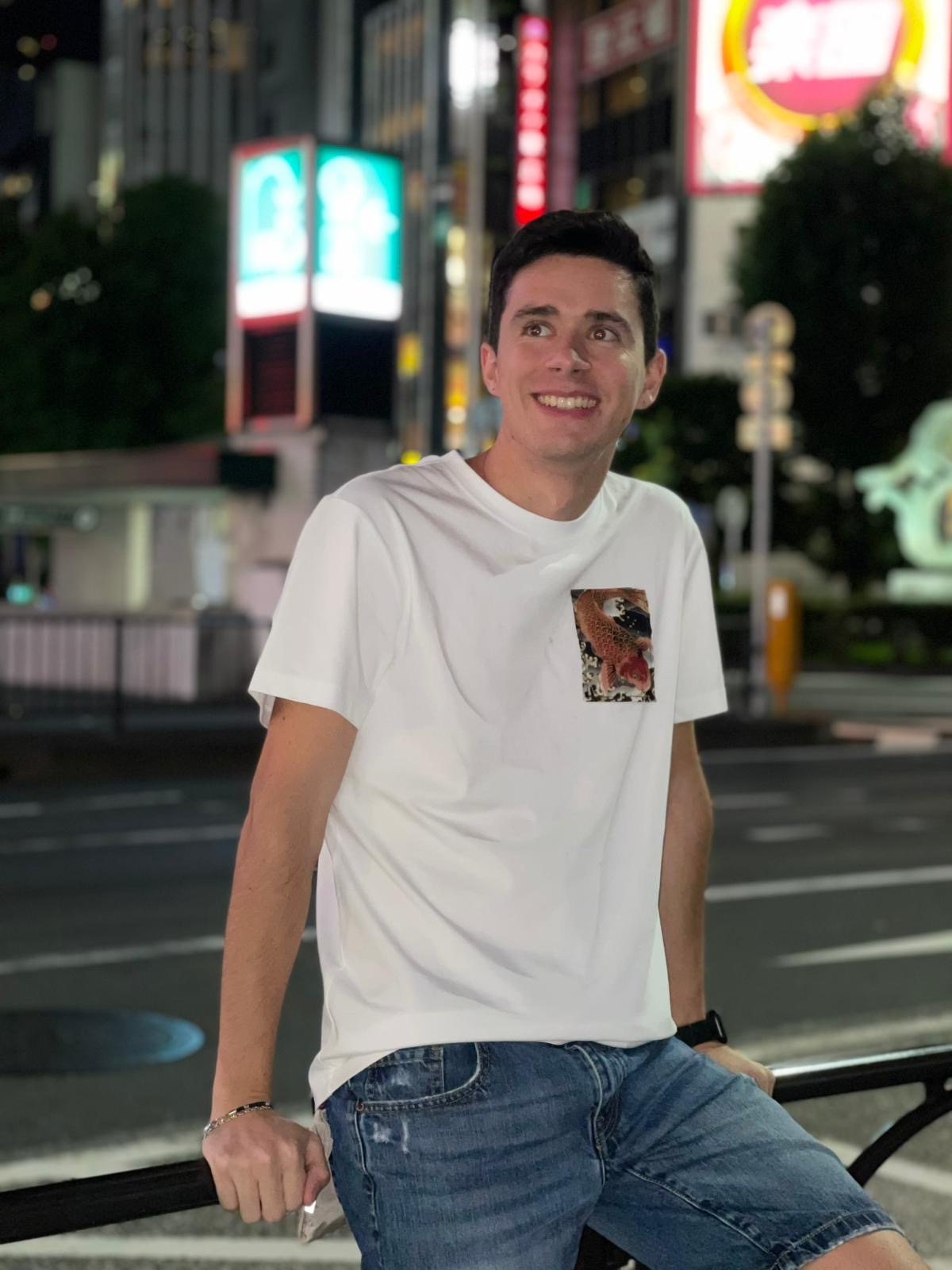 a man sitting on a bench