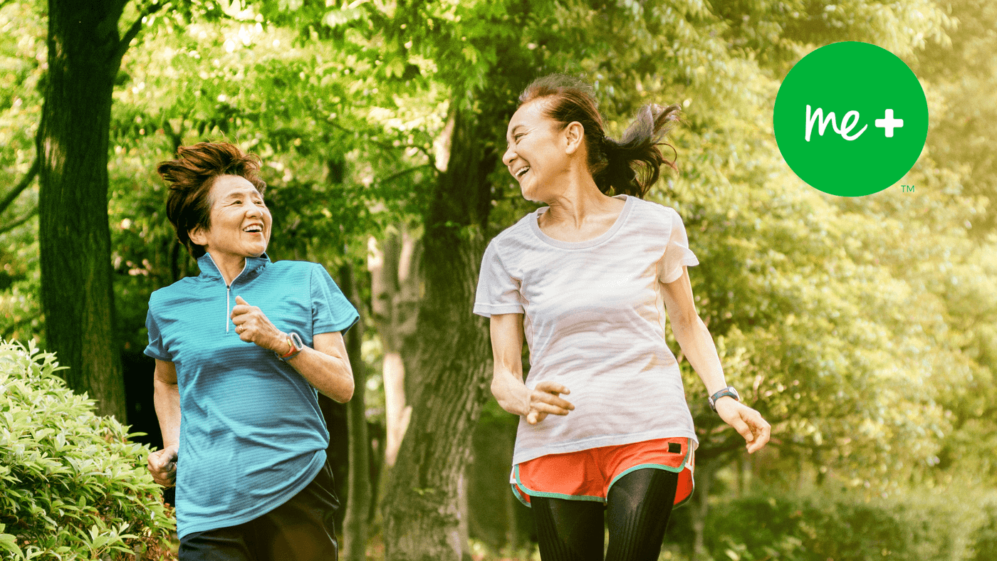 two women running in the woods